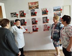 "Герои в белых халатах" - выставка фотографий медицинских работников нашего района - ветеранов Великой Отечественной войны